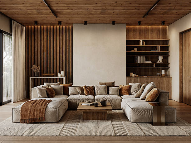 Loft enteriőr modern barna falpanel és könyvespolc, nappali bútorokkal.
